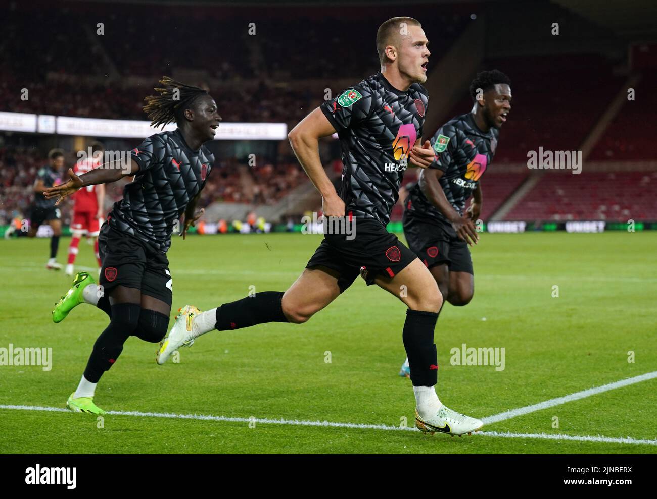 Barnsley's Josh Benson celebrates scoring their side's first goal of the game during the Carabao Cup, first round match at the Riverside Stadium, Middlesbrough. Picture date: Wednesday August 10, 2022. Stock Photo