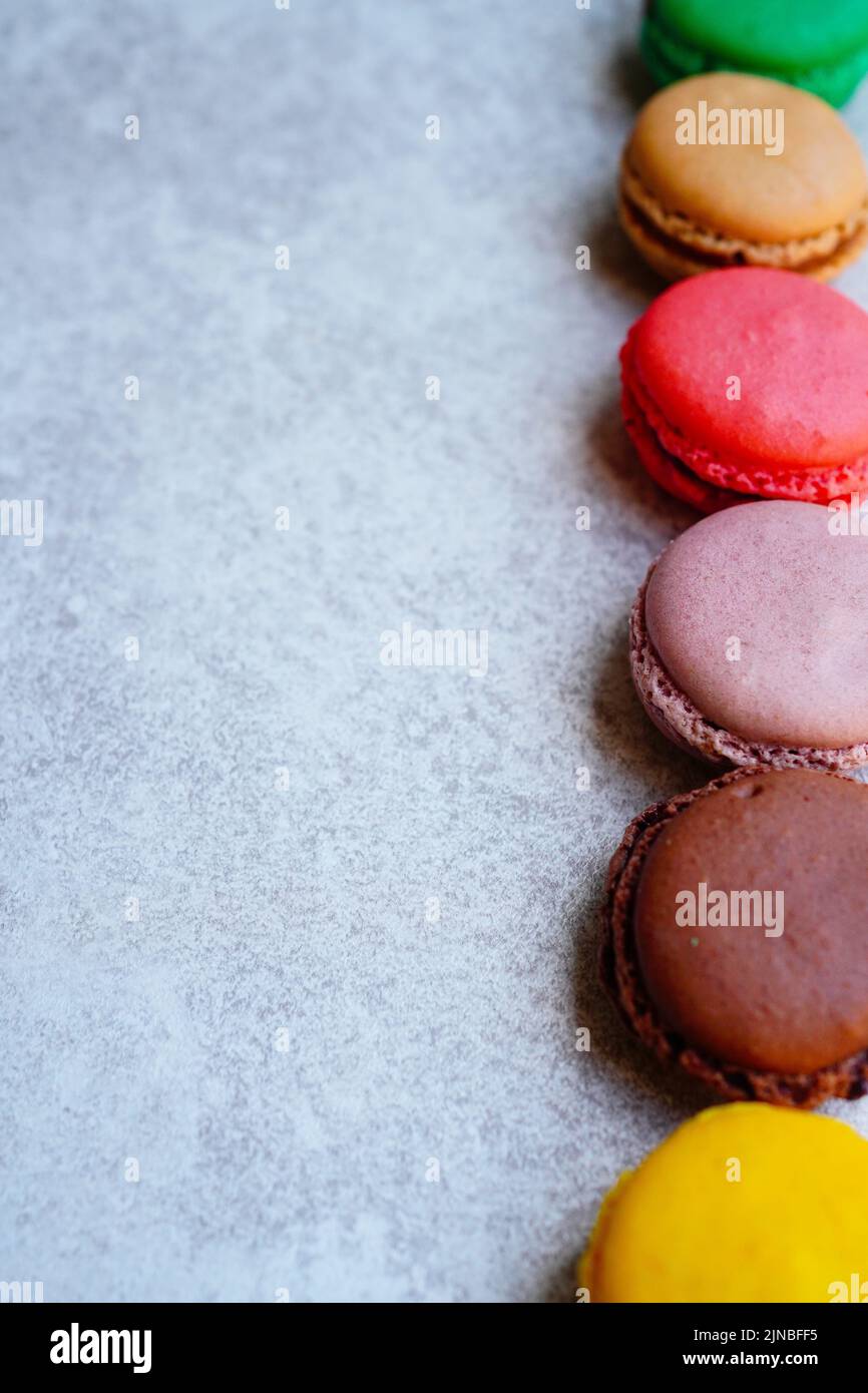 Vertically arranged colorful macaroons Stock Photo