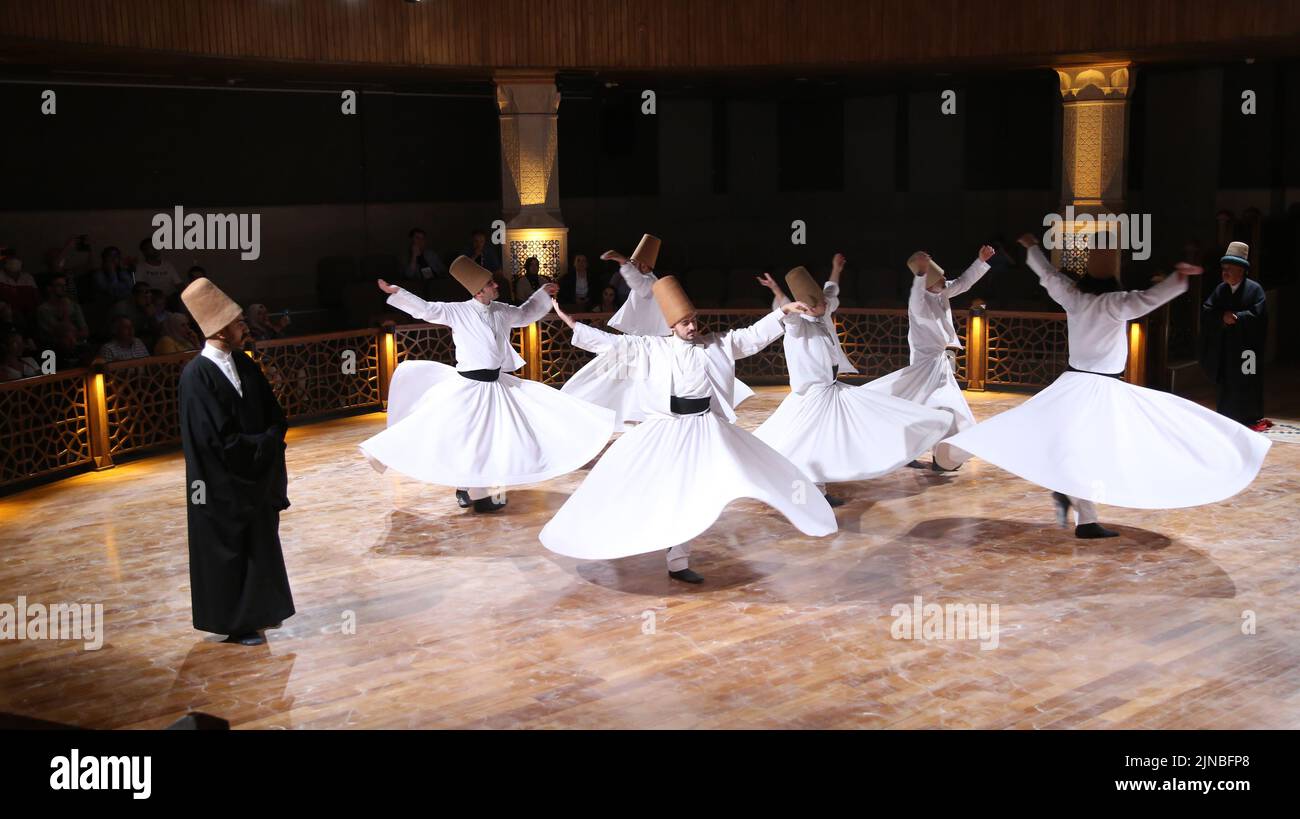 Konya, T?Rkiye. 10th Aug, 2022. People perform the Sufi whirling dance in Konya, T¨¹rkiye, on Aug. 10, 2022. Credit: Li Zhenbei/Xinhua/Alamy Live News Stock Photo