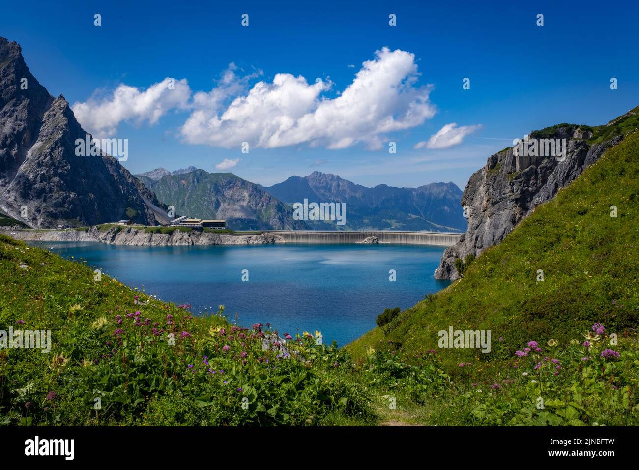 Wonderful landscape at the Luenersee with dam wall and rocks in Vorarlberg, Austria Stock Photo