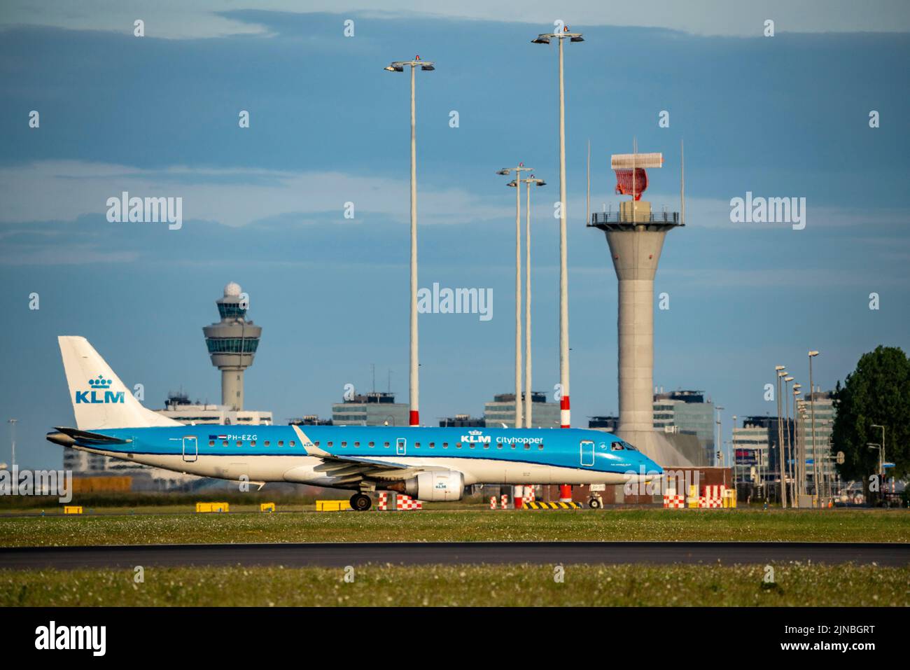 Amsterdam Shiphol Airport, Polderbaan, one of 6 runways, tower air traffic control, on taxiway for take-off, PH-EZG, KLM Cityhopper Embraer ERJ-190 Stock Photo
