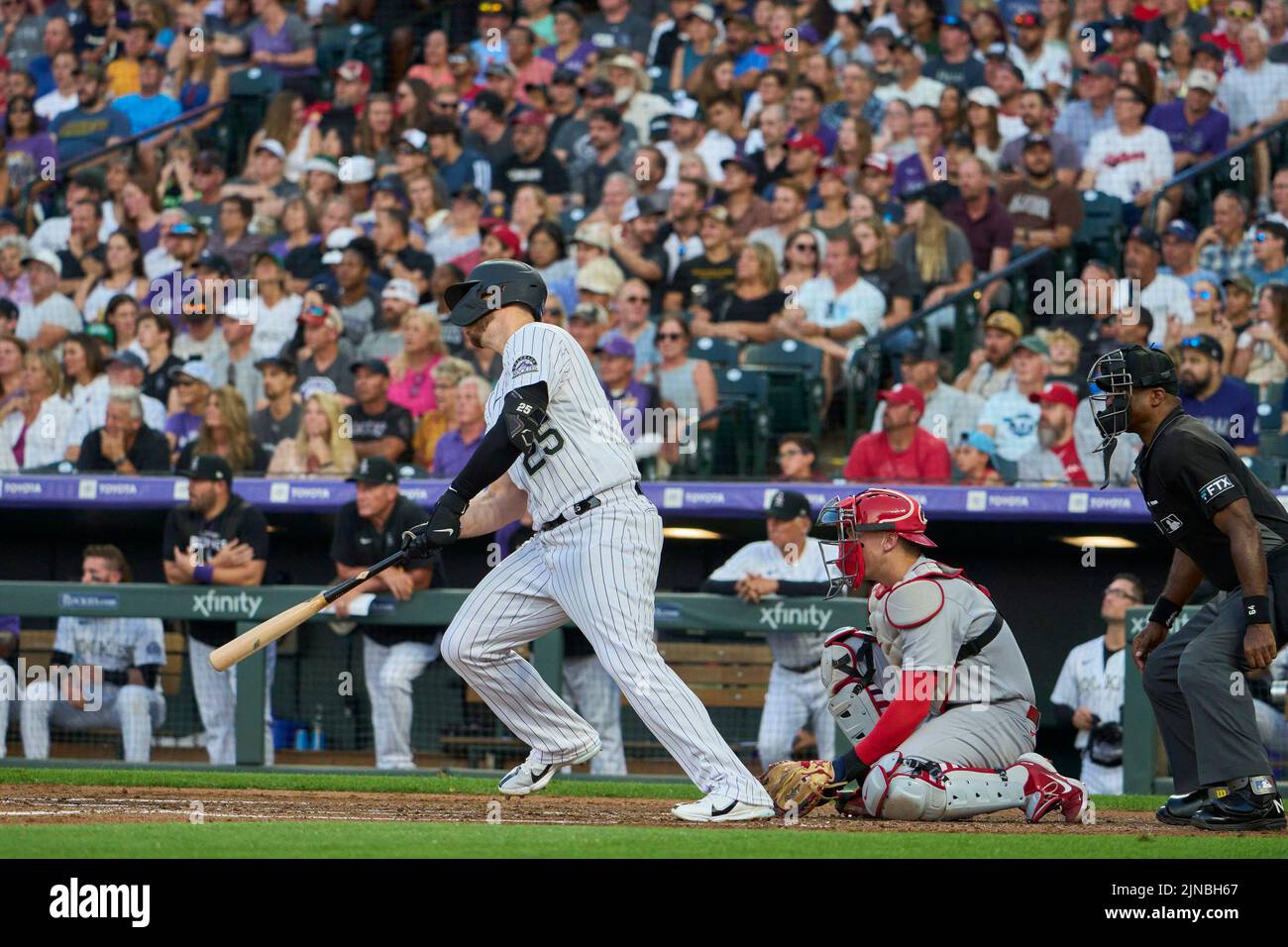 August 9 2022: Colorado first baseman C.J. Cron (25) gets a hit during the game with Saint Louis Cardinals and Colorado Rockies held at Coors Field in Denver Co. David Seelig/Cal Sport Medi Stock Photo