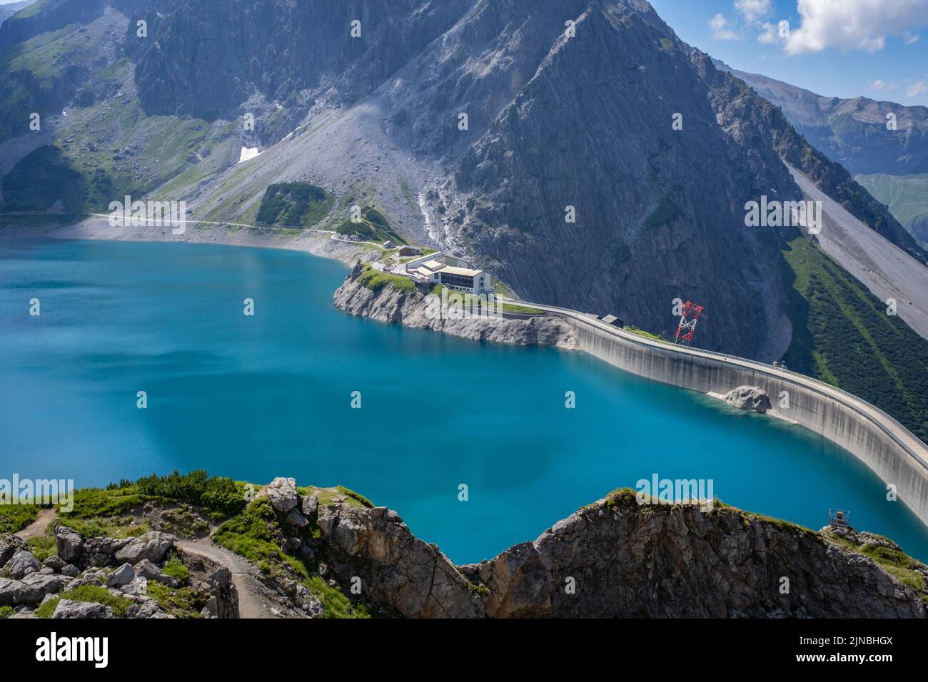 Wonderful landscape at the Luenersee with dam wall and rocks in Vorarlberg, Austria Stock Photo