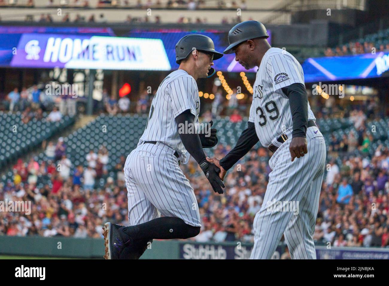 August 9 2022: Colorado center fielder Randall Grichuk (15) hits a homer one of his five hits during the game with Saint Louis Cardinals and Colorado Rockies held at Coors Field in Denver Co. David Seelig/Cal Sport Medi Stock Photo