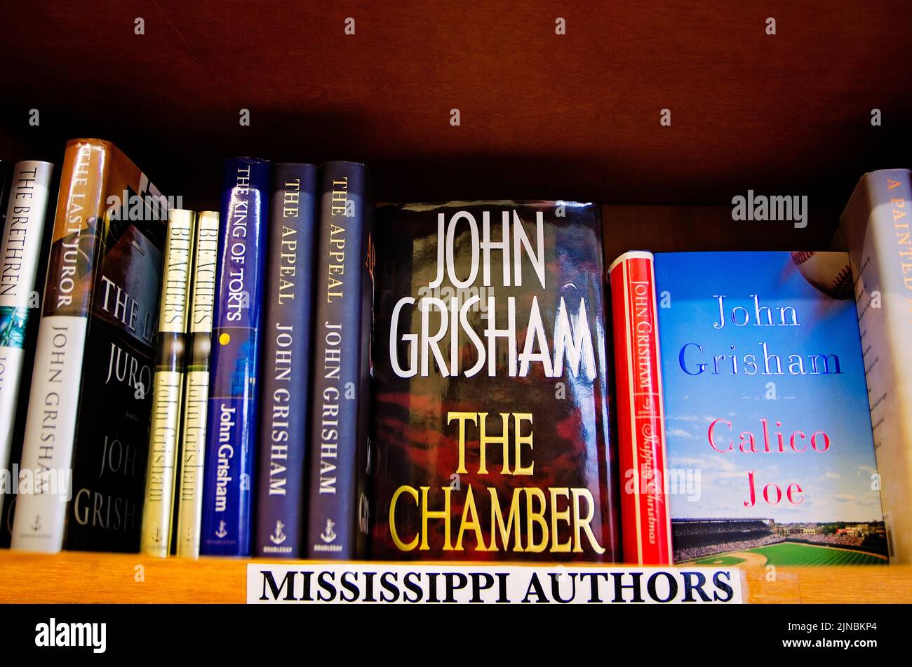 Mississippi author John Grisham’s books fill the shelves at Square Books, May 31, 2015, in Oxford, Mississippi. Stock Photo