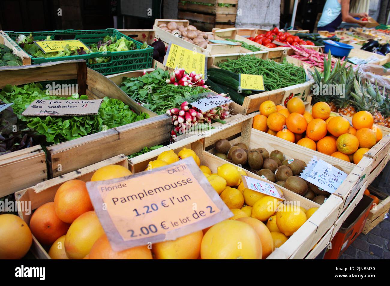 Traditional French vegetable stall,with fresh, healthy vegetables and fruit , on the food market in France Stock Photo