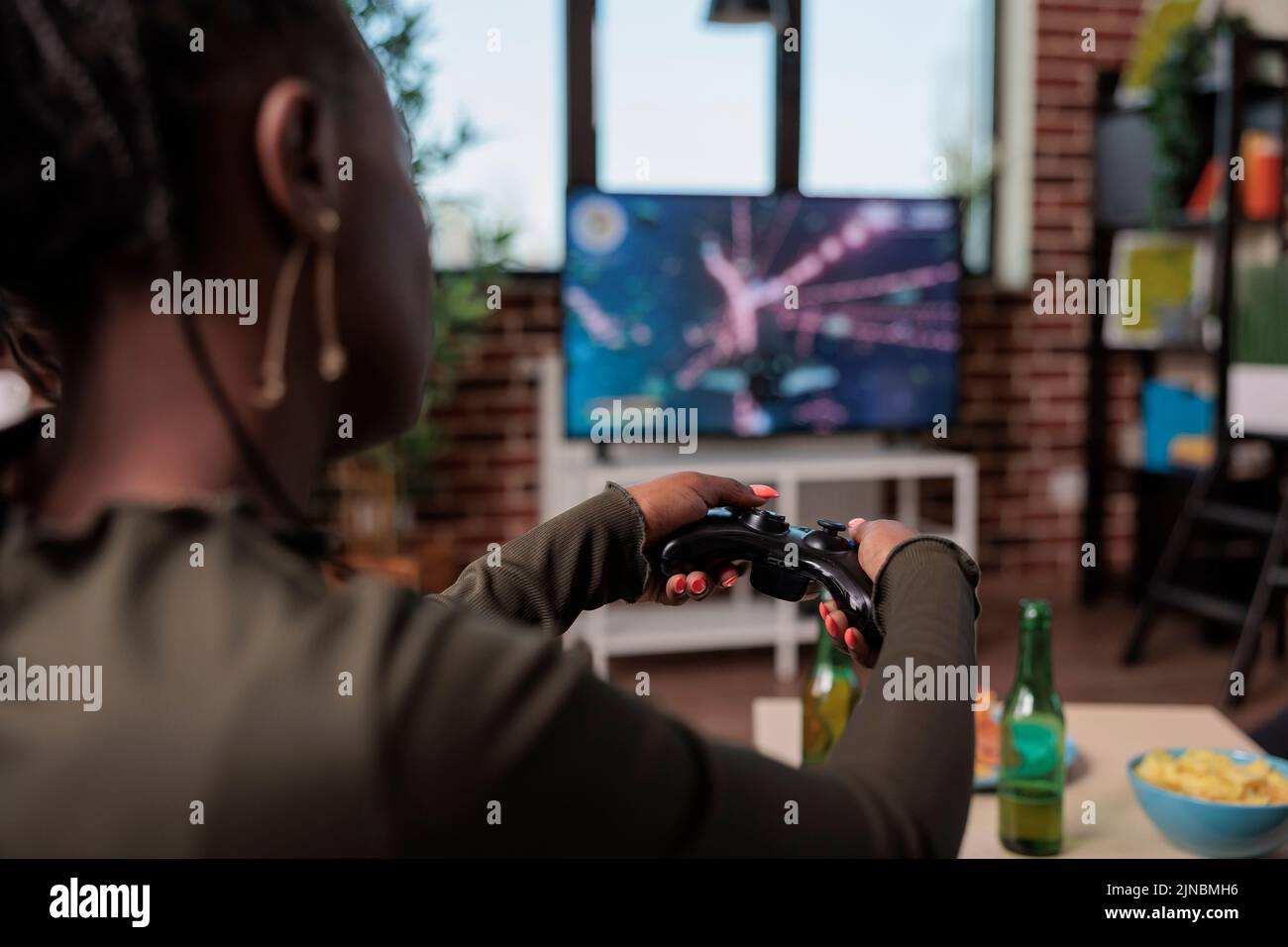 Men Relax By Playing Competitive Video Games As Friends In A Local Internet  Bar That Specializes In Online Gaming Stock Photo, Picture and Royalty Free  Image. Image 81203430.