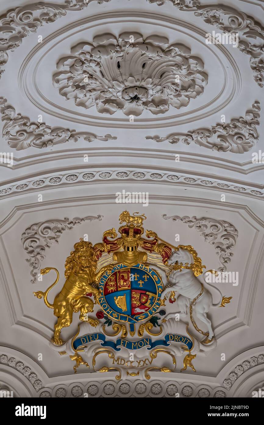 London, UK- July 4, 2022: Trafalgar Square. Inside St. Martin-in-the-fileds church, closeup of British Royal emblem and motto of Order of the Garter s Stock Photo