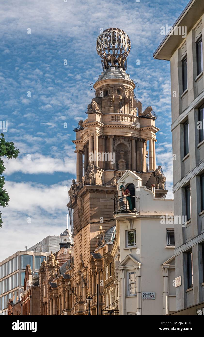 London, UK- July 4, 2022: Off Trafalgar Square, St. Martin Lane. Sculpted tower on top of English National Opera, or ENO, in the Coliseum building, un Stock Photo