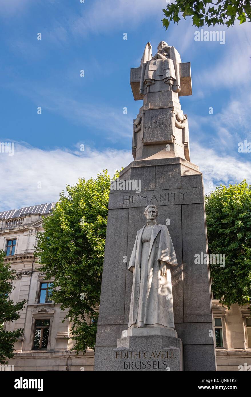 London, UK- July 4, 2022: Off Trafalgar Square. Closeup of Edith Cavell Memorial is stone obelisk with Marble statues featuring her image and appealin Stock Photo