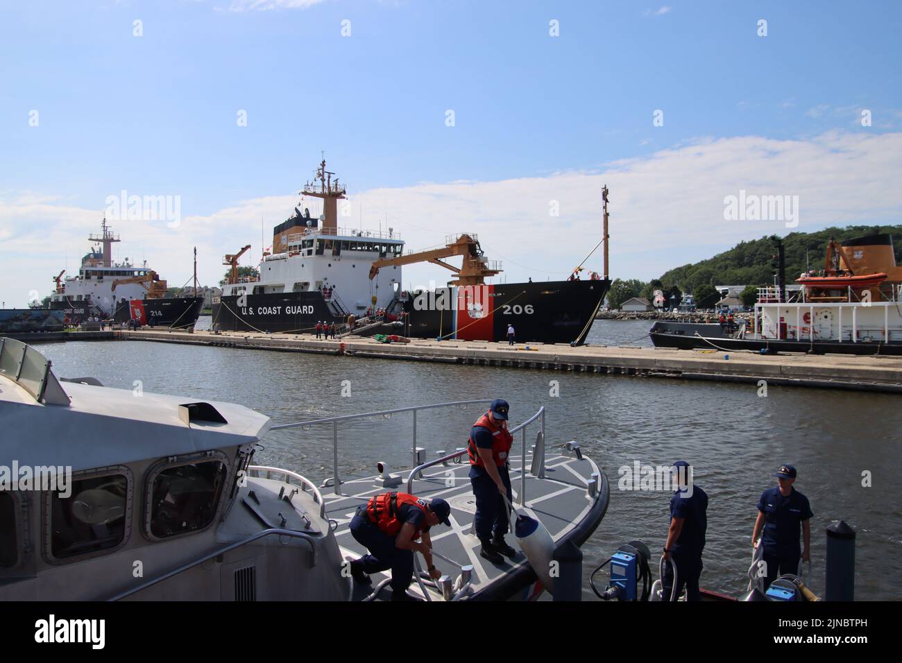 The crew of a 47foot Motor Lifeboat ties up at Coast Guard Station