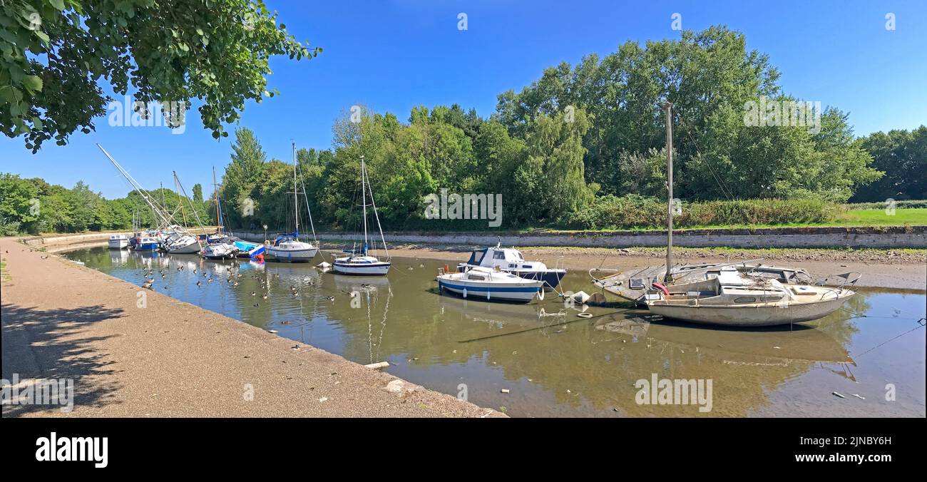 Spike Island canal marina in summer at very low water, Widnes, Halton, Cheshire, England, UK, WA8 0QR Stock Photo