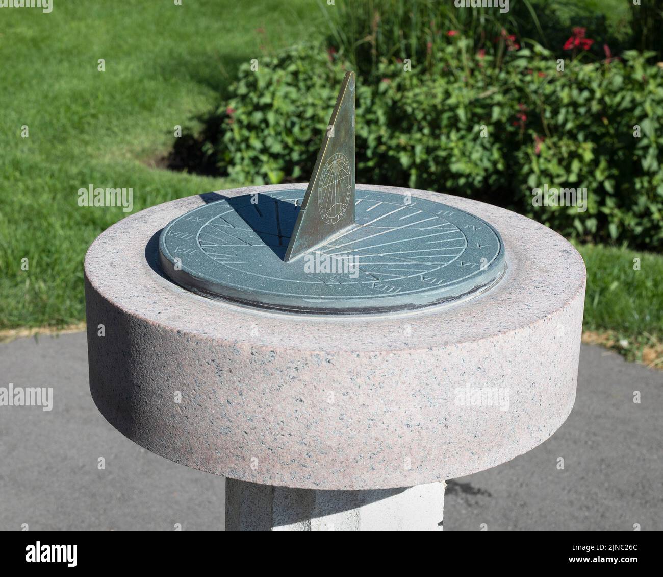 Sundial with shadow showing the time as 1000 in the morning, Riley Park, Calgary, Alberta