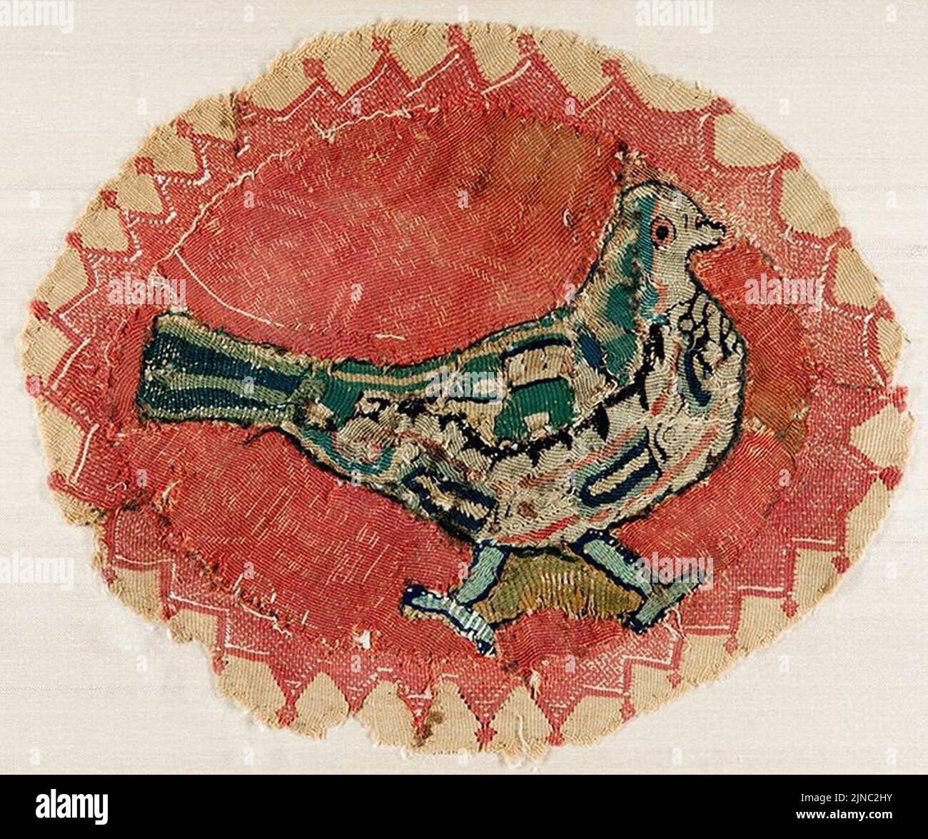 Textile roundel with dove. Egypt, 5th-6th century CE Stock Photo