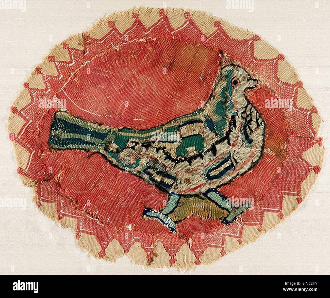 Textile roundel with dove. Egypt, 5th-6th century CE Stock Photo - Alamy