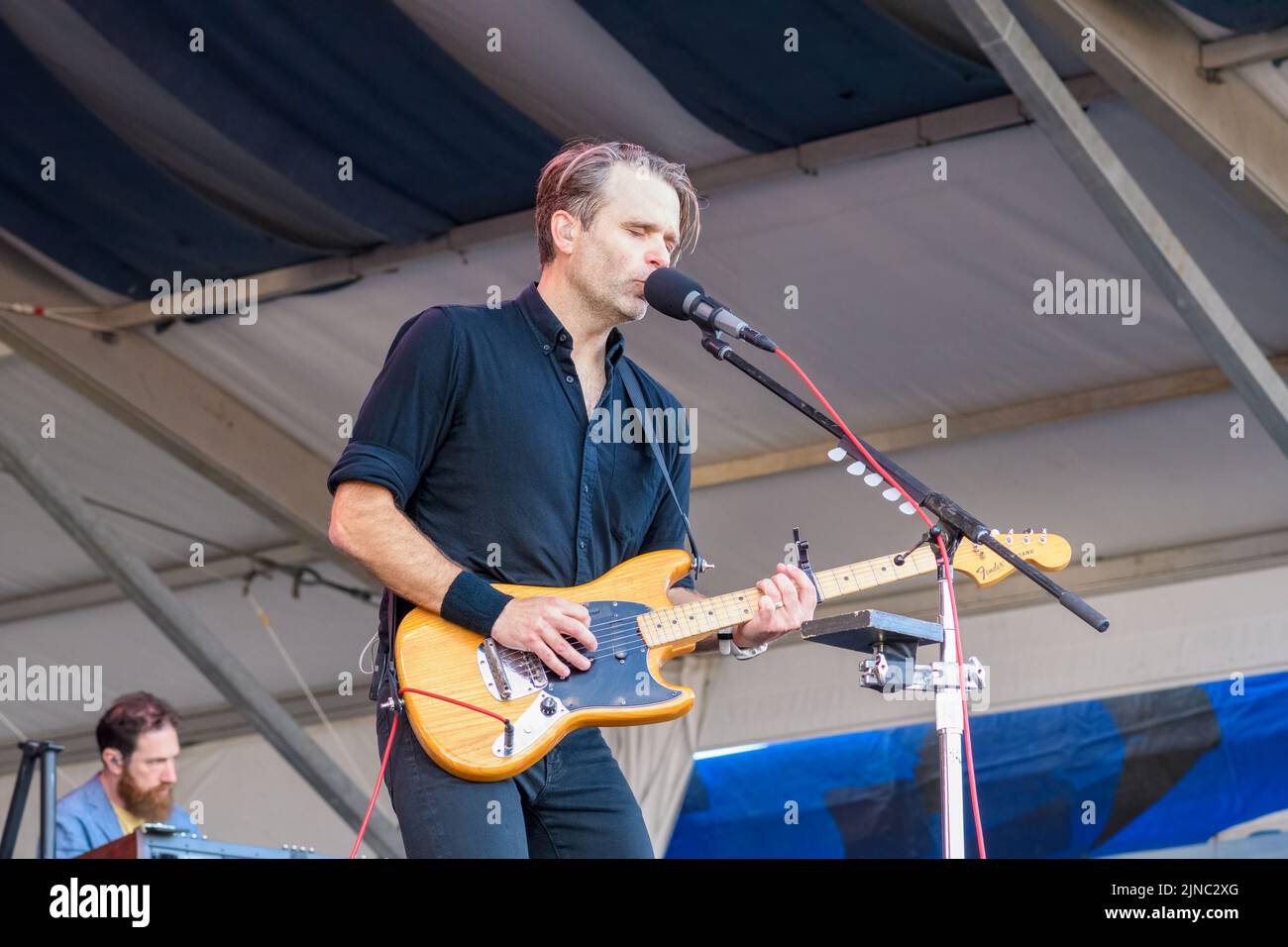 NEW ORLEANS, LA, USA - APRIL 29, 2022: Ben Gibbard and Zac Rae of Death Cab For Cutie perform at the 2022 New Orleans Jazz and Heritage Festival Stock Photo