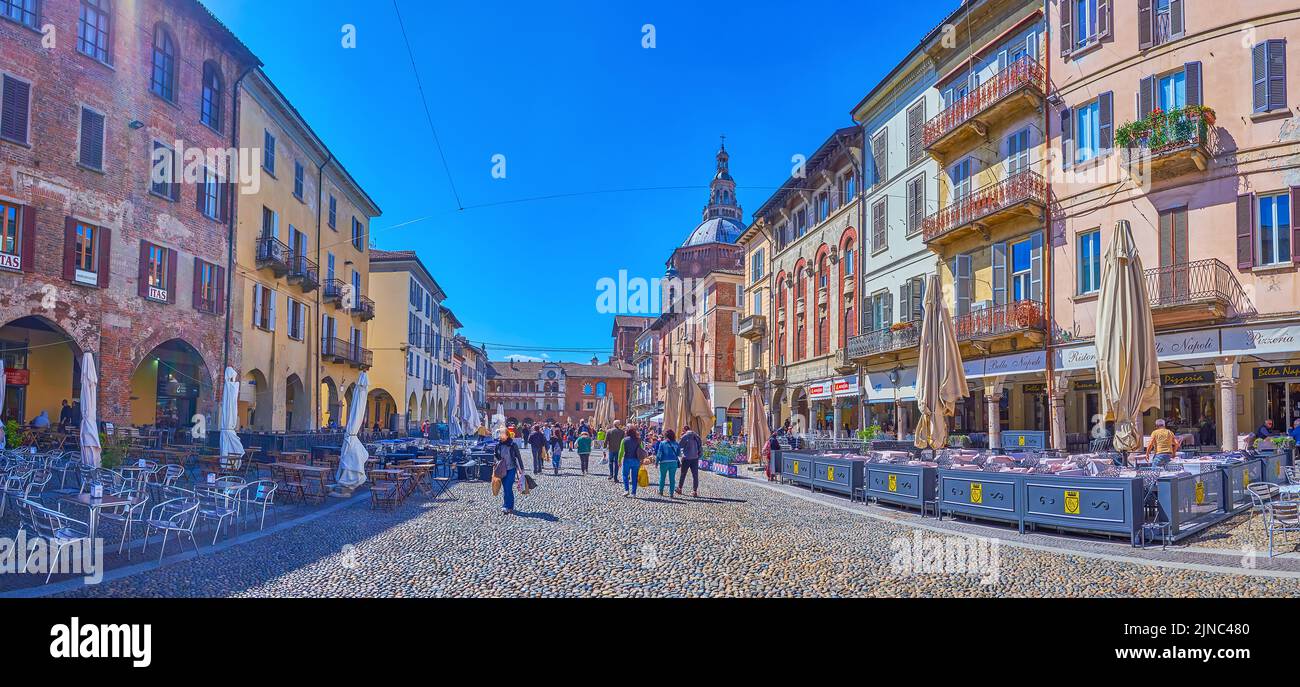PAVIA, ITALY - APRIL 9, 2022: The central squar of Pavia, Piazza della Vittorio is a heart of city life with numerous outdoor restaurants, on April 9 Stock Photo