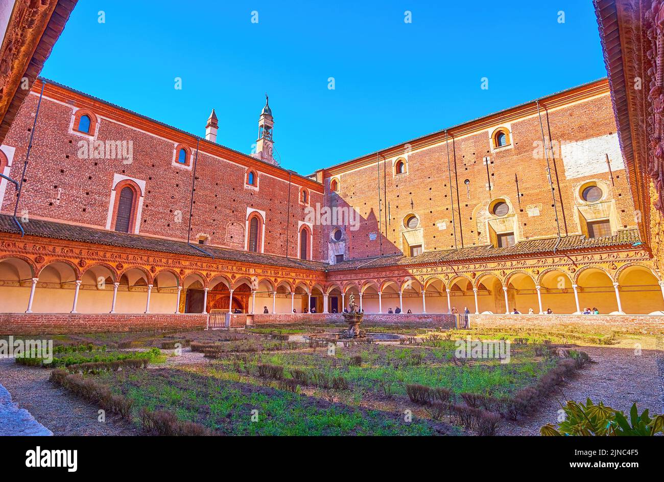 The small cloister with the garden of Certosa di Pavia monastery, Italy Stock Photo