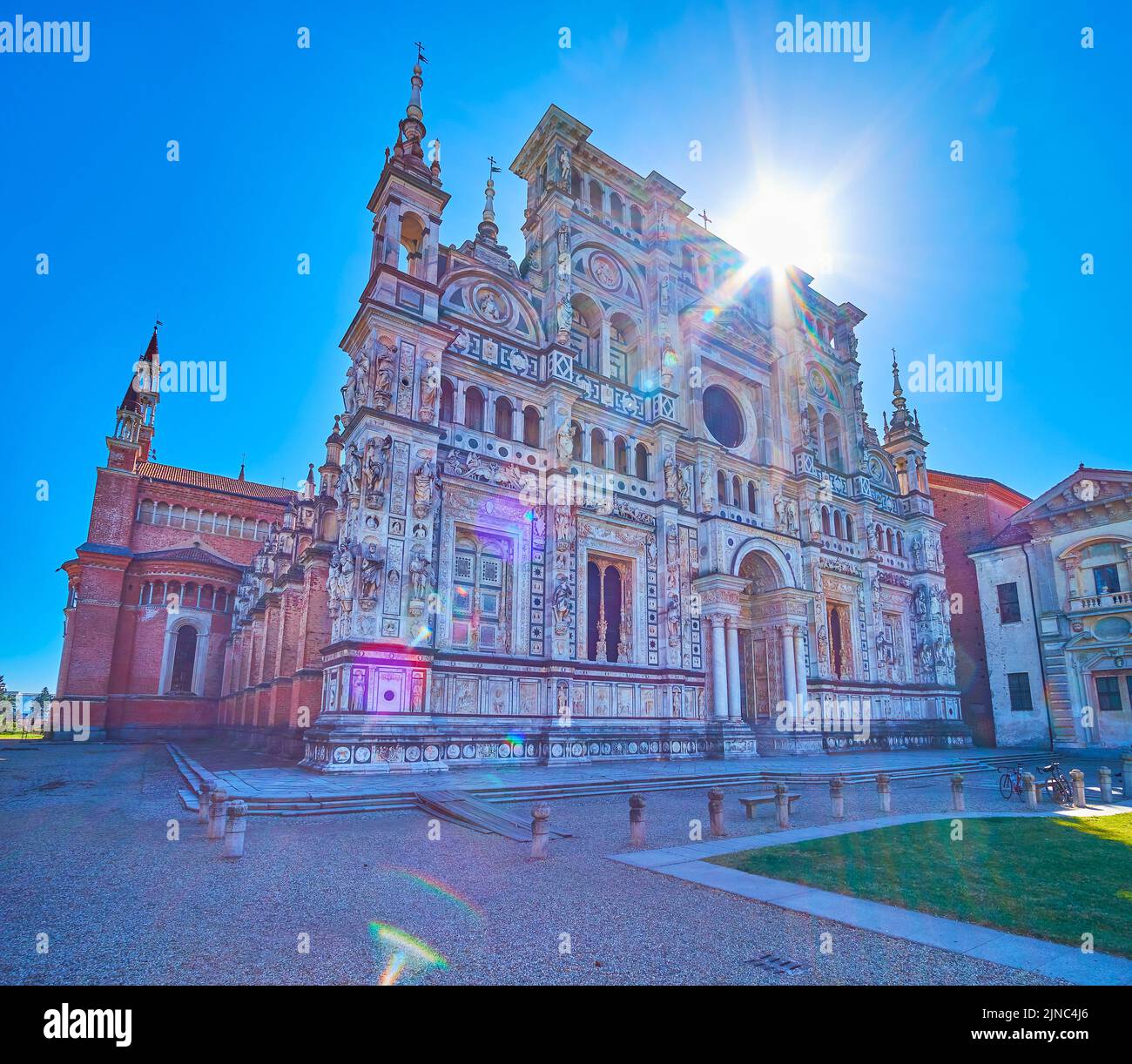 The marble facade with colorful carved decorations of Cathedral of Certosa di Pavia monastery, Italy Stock Photo