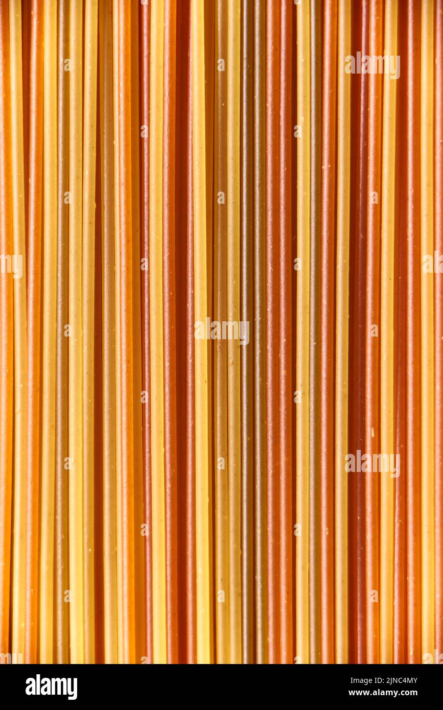 Abstract italian food background, raw colourful vegetable spaghetti