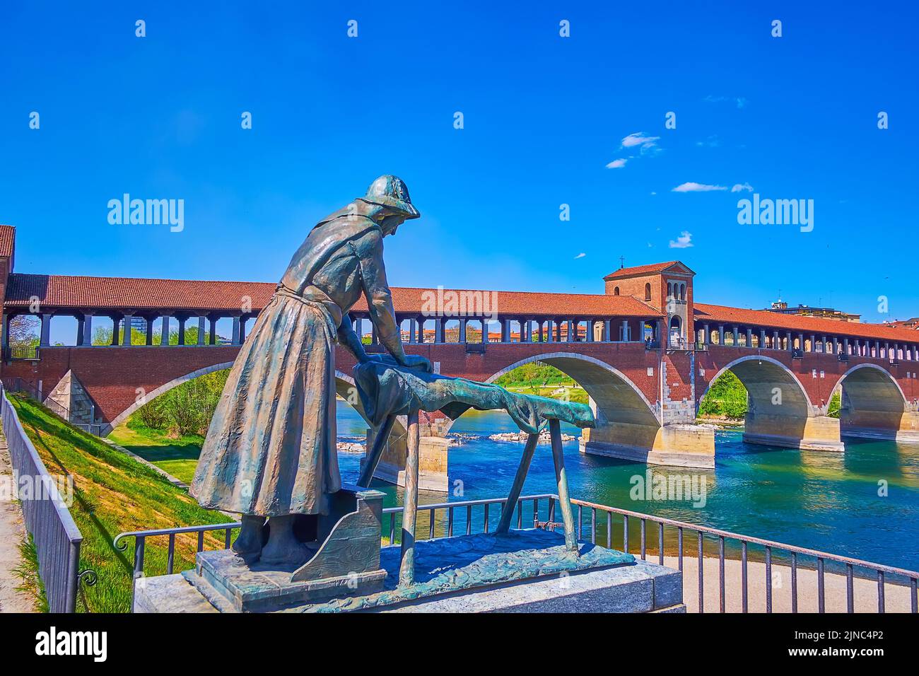 PAVIA, ITALY - APRIL 9, 2022: The monument to the Loundress on the bank of Ticino river, on April 9 in Pavia, Italy Stock Photo