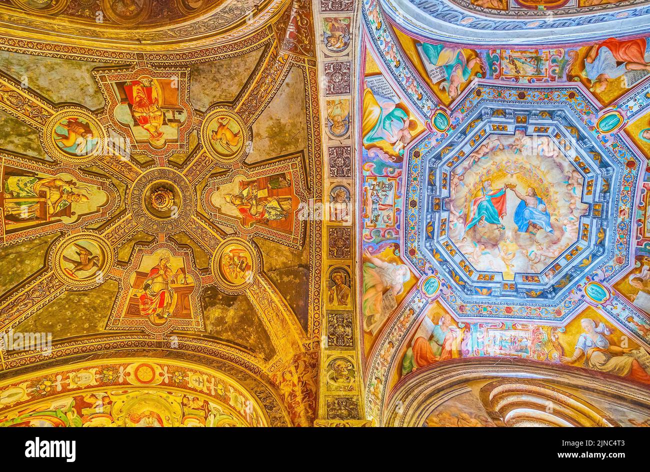 PAVIA, ITALY - APRIL 9, 2022: The vault with colorful frescoes of San Michele Maggiore Basilica, on April 9 in Pavia, Italy Stock Photo