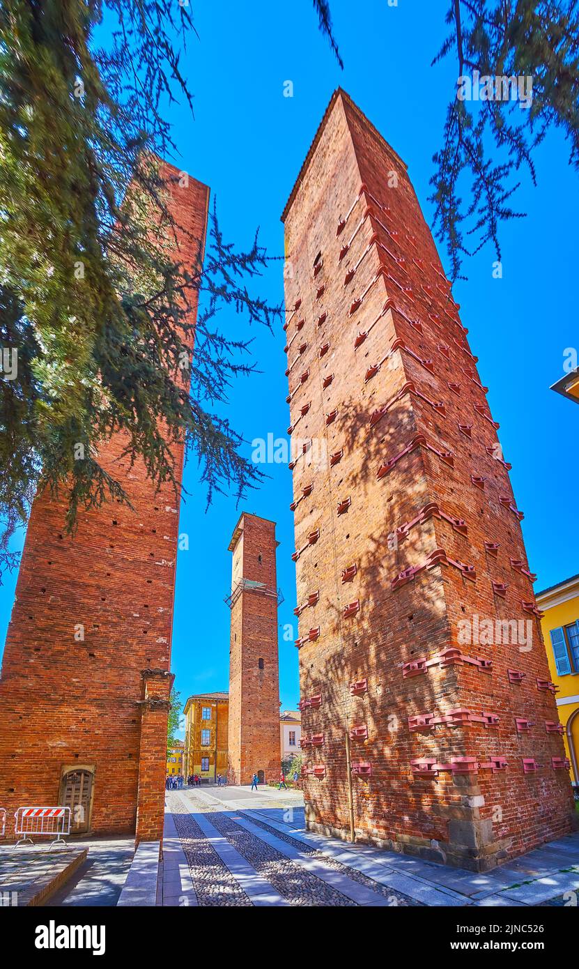 Enjoy magnificent preserved medieval towers in old district of Pavia, Italy Stock Photo