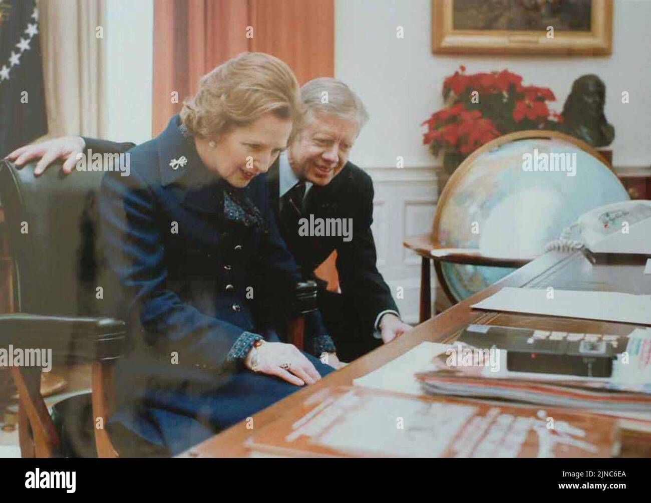 Thatcher at Oval Office desk with Carter Stock Photo Alamy