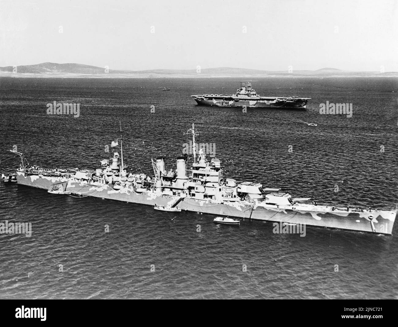 The US aircraft carrier USS Wasp and the heavy cruiser USS Wichita in Scapa Flow. USS Wasp was sunk a few months later after being torpedoed during the invasion of Guadalcanal in September 1942. Stock Photo