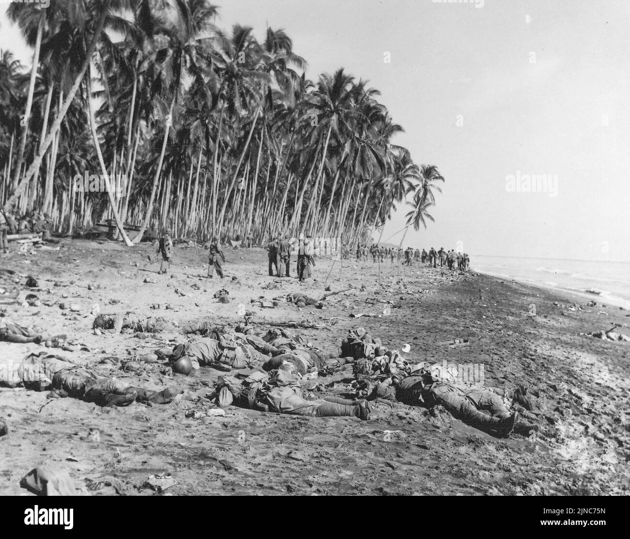 Dead Japanese soldiers on the sandbar at the mouth of Alligator Creek, Guadalcanal after the Battle of the Tenaru Stock Photo