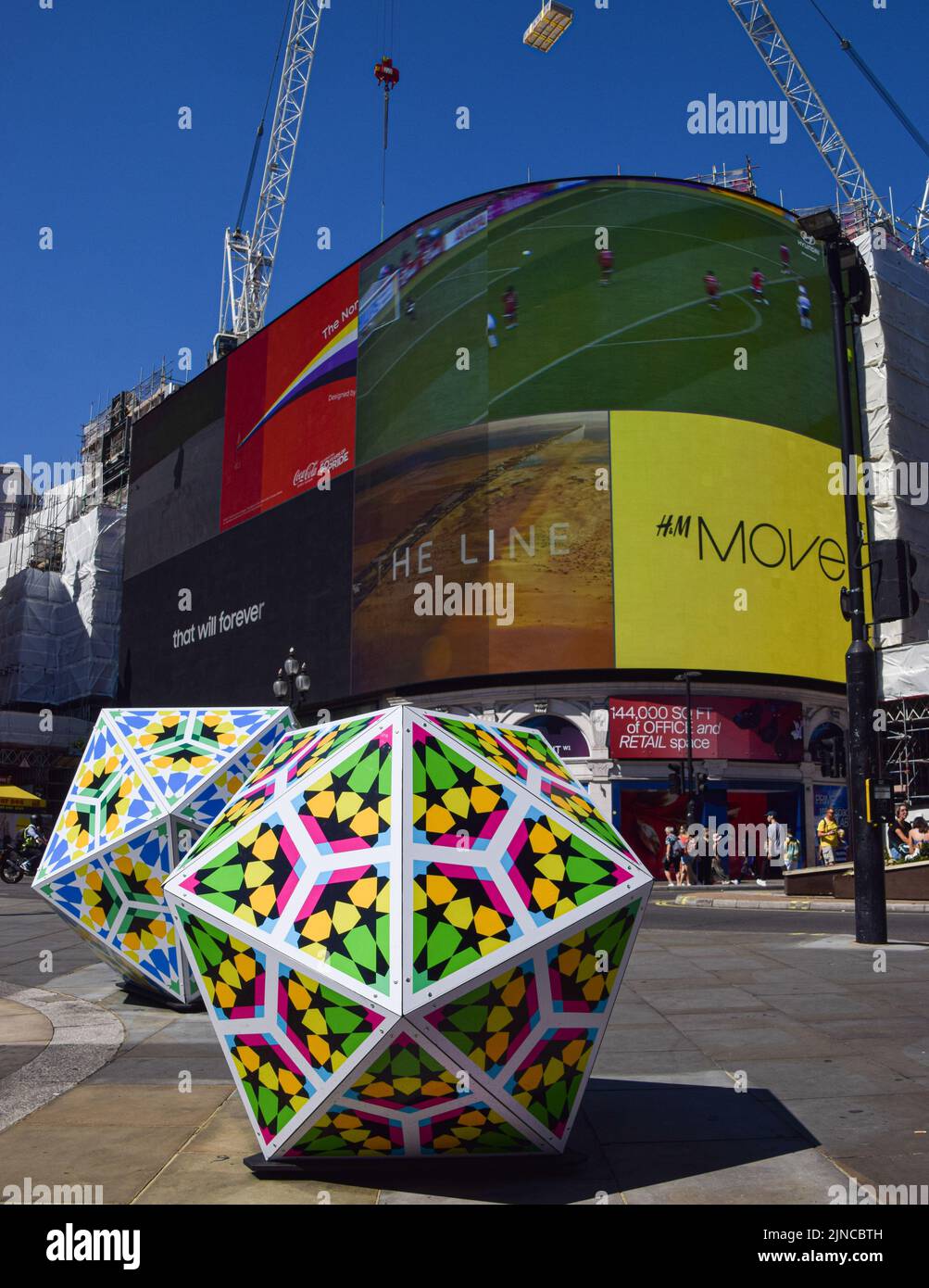 London, UK. 10th Aug, 2022. 'Pop Geometric Icosahedron' artwork by Zarah Hussain seen in Piccadilly Circus, part of the Art of London Brighter Future public art exhibition. (Photo by Vuk Valcic/SOPA Images/Sipa USA) Credit: Sipa USA/Alamy Live News Stock Photo
