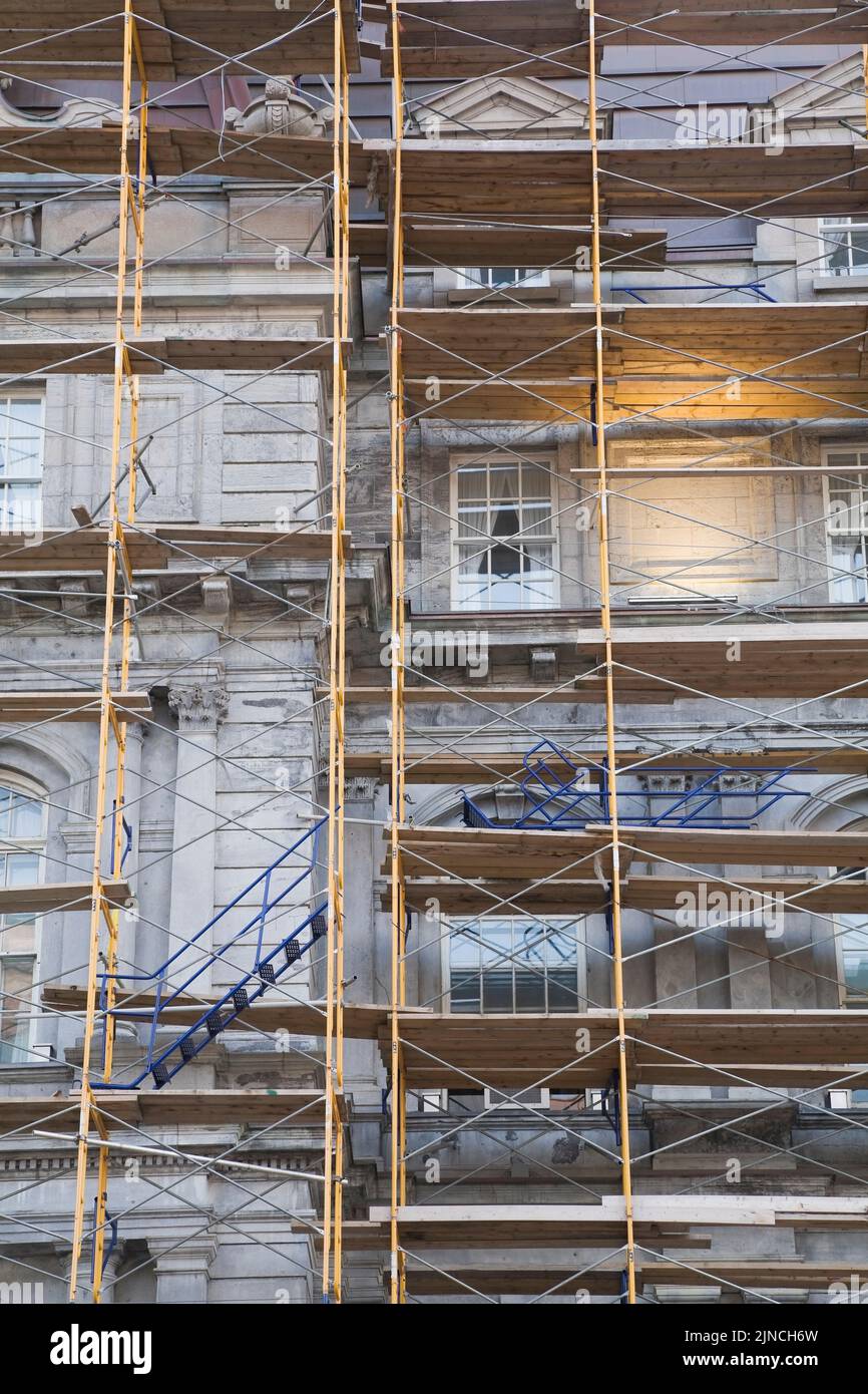 Scaffolding on the outside of the Montreal City Hall building being renovated, Old Montreal, Quebec, Canada Stock Photo