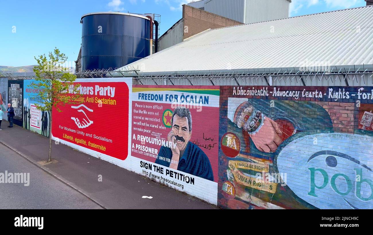 The famous Wall Murals of Belfast on the houses and Peace Wall