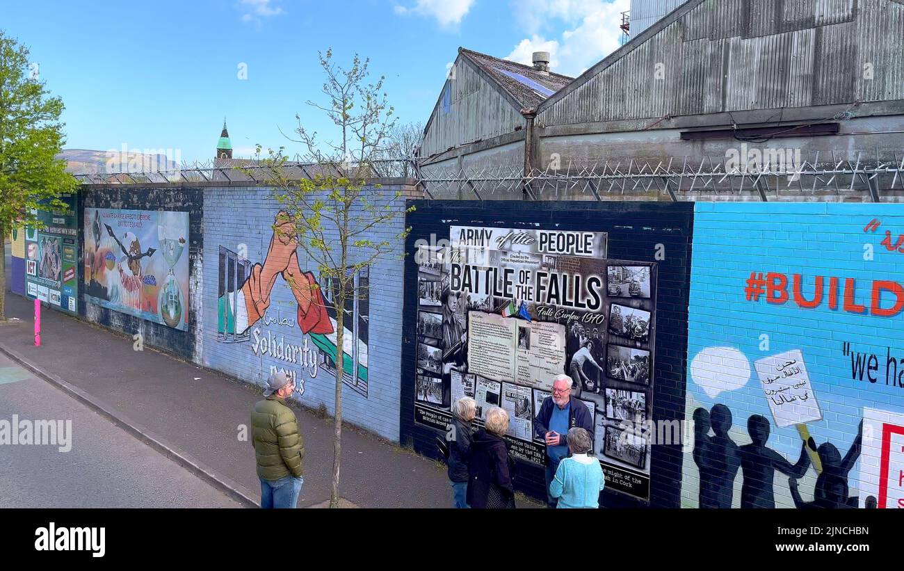 The famous Wall Murals of Belfast on the houses and Peace Wall