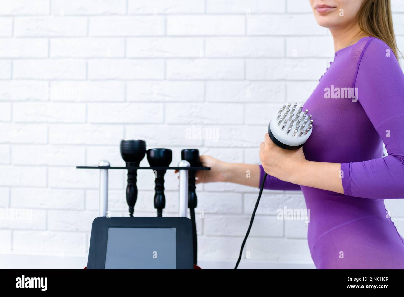 Slimming vacuum hot massage machine. Vacuum massage. LPG massage for