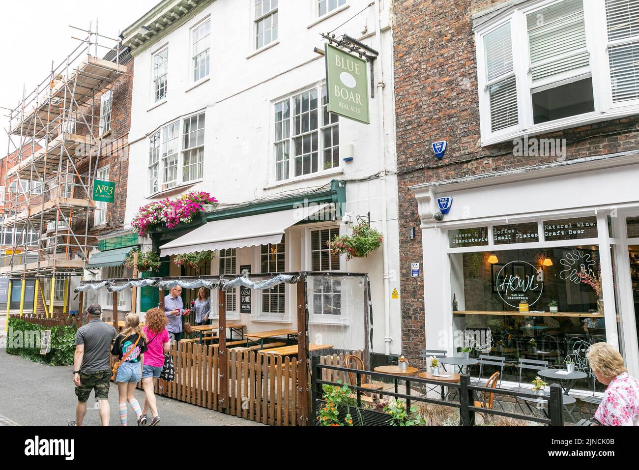 Blue Boar public house next to a cafe in York city centre,Yorkshire