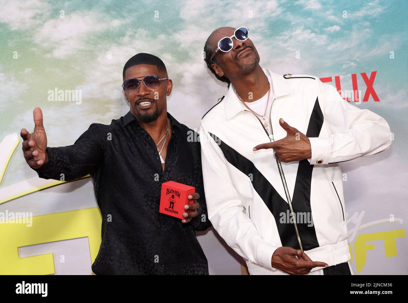 Cast members Jamie Foxx and Snoop Dogg attend the premiere for the film Day Shift in Los Angeles, California, U.S., August 10, 2022. REUTERS/Mario Anzuoni Stock Photo