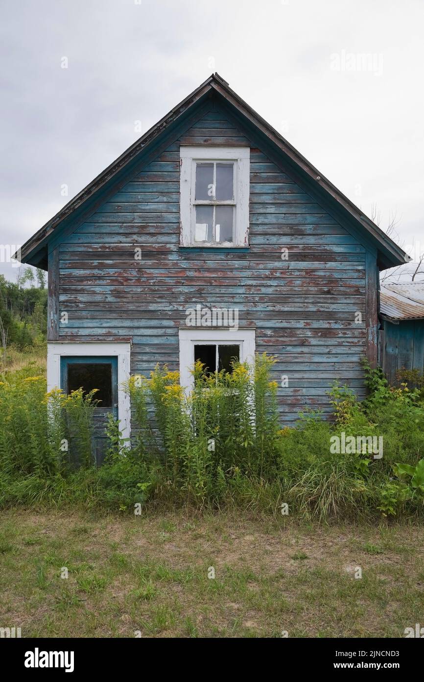 Old abandoned house in a field, Quebec, Canada Stock Photo