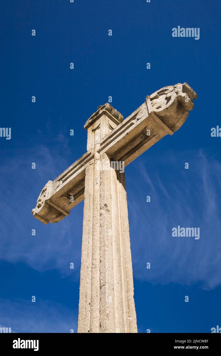 Cross against a blue sky background, San Antonio des Capuchos Church, Guimaraes, Portugal. Stock Photo