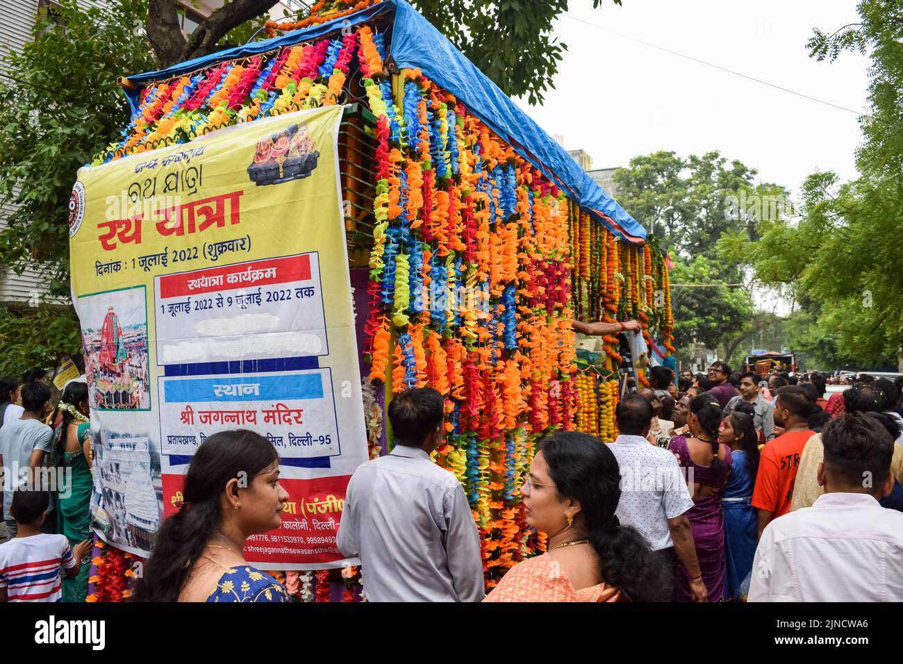 New Delhi, India July 01 2022 - A huge gathering of devotees from different parts of Delhi on the occasion of ratha yatra or rathyatra. Rath for Lord Stock Photo