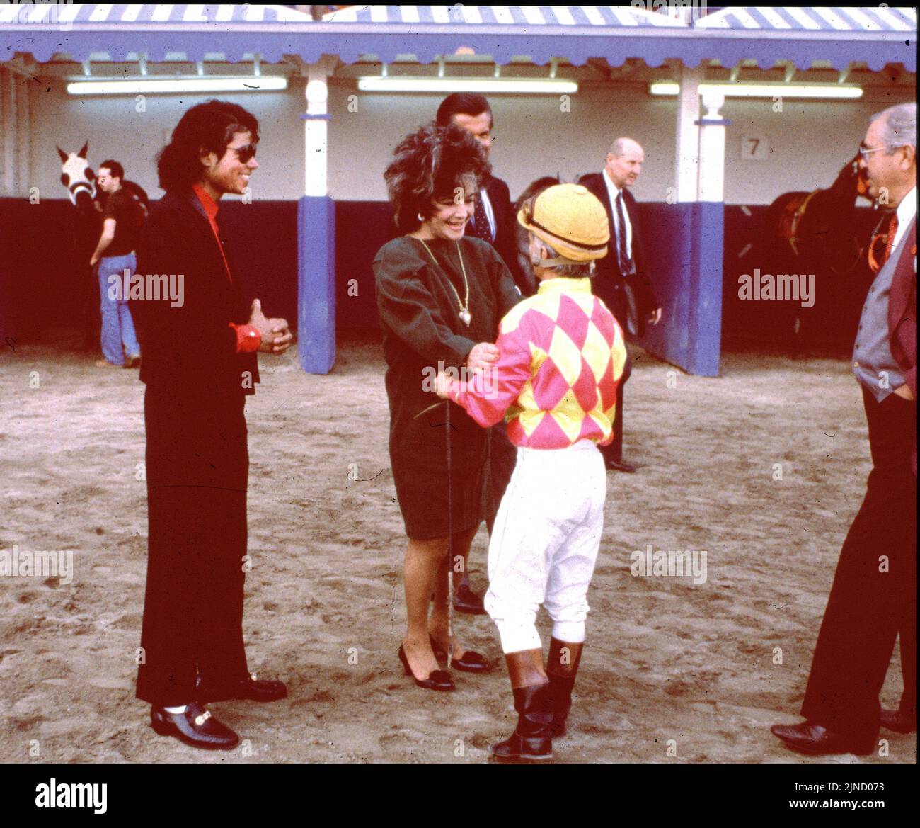 Elizabeth Taylor & Michael Jackson attending a horse race, 1986 Credit Ron Wolfson / MediaPunch