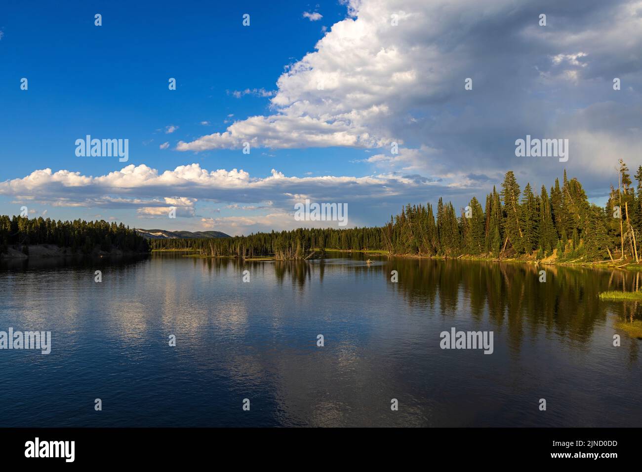 This is a view of the Yellowstone River looking northeast from Fishing Bridge in Yellowstone National Park, Teton County, Wyoming. Stock Photo