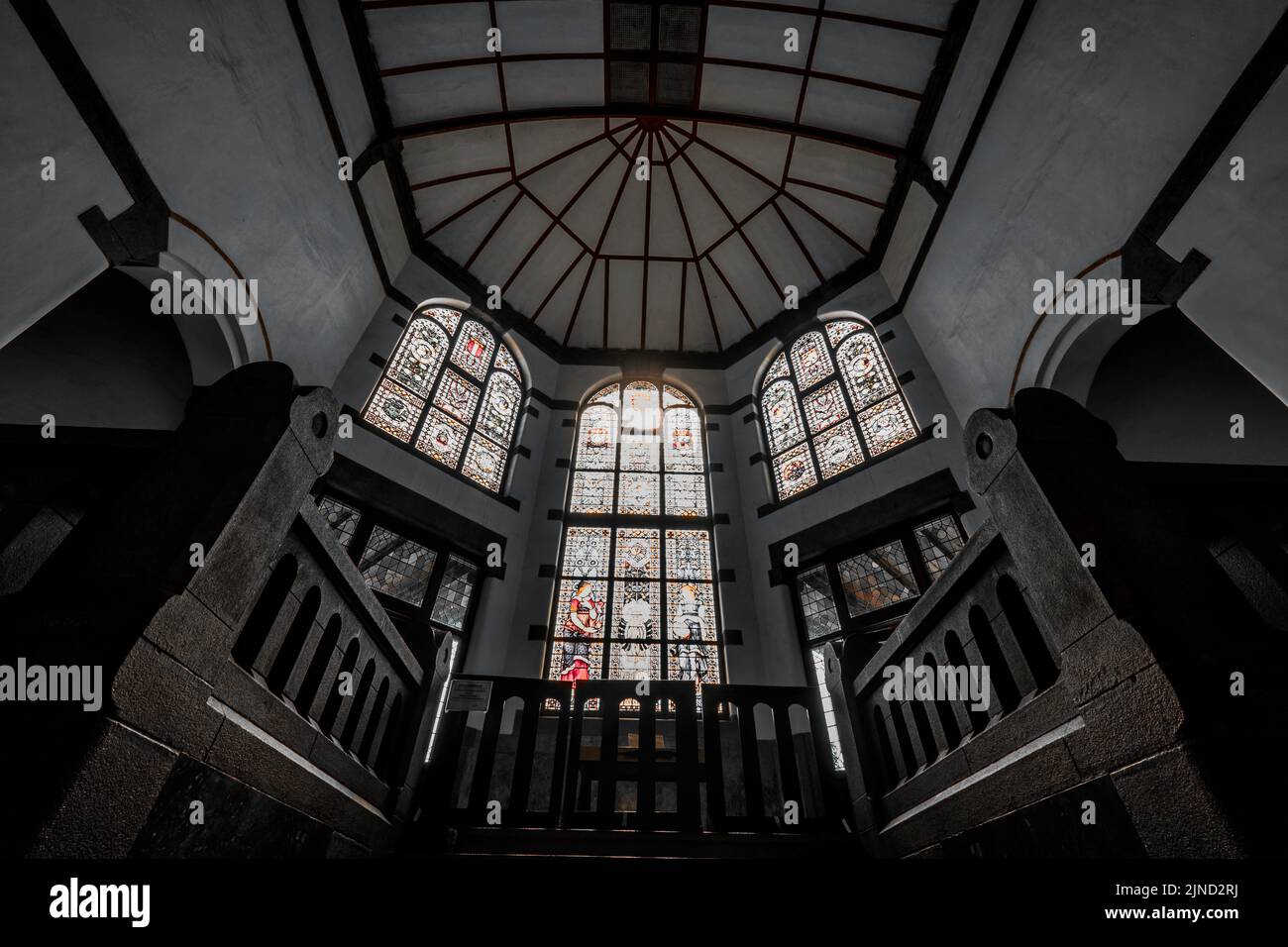 It can be concluded that the overall meaning of the painting contained in the stained glass in the Lawang Sewu building is the Netherlands which is de Stock Photo