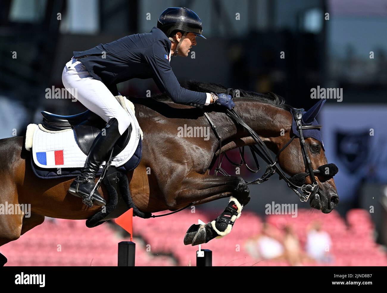 Herning. Denmark. 10 August 2022. World Equestrian Games. Stables. Simon Delestre (FRA) riding CAYMAN JOLLY JUMPER during the FEI World Team & Individual Jumping Championship - First Competition - Speed. Stock Photo