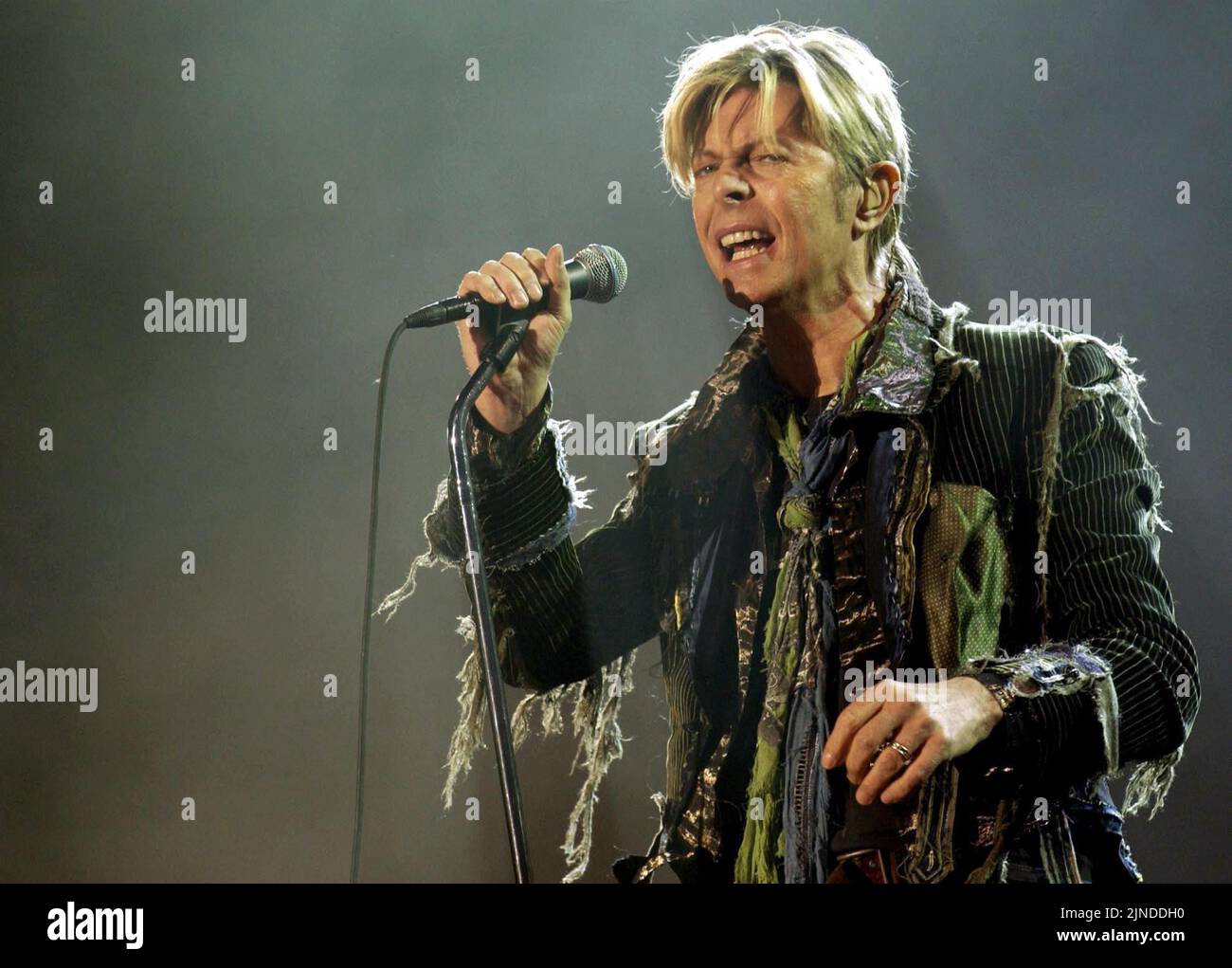 File photo dated 13/6/2004 of David Bowie performing onstage during the Isle of Wight festival, as Mr Bowie has has been named Britain's most influential artist of the last 50 years for his ability to transcend music, film and fashion. Stock Photo