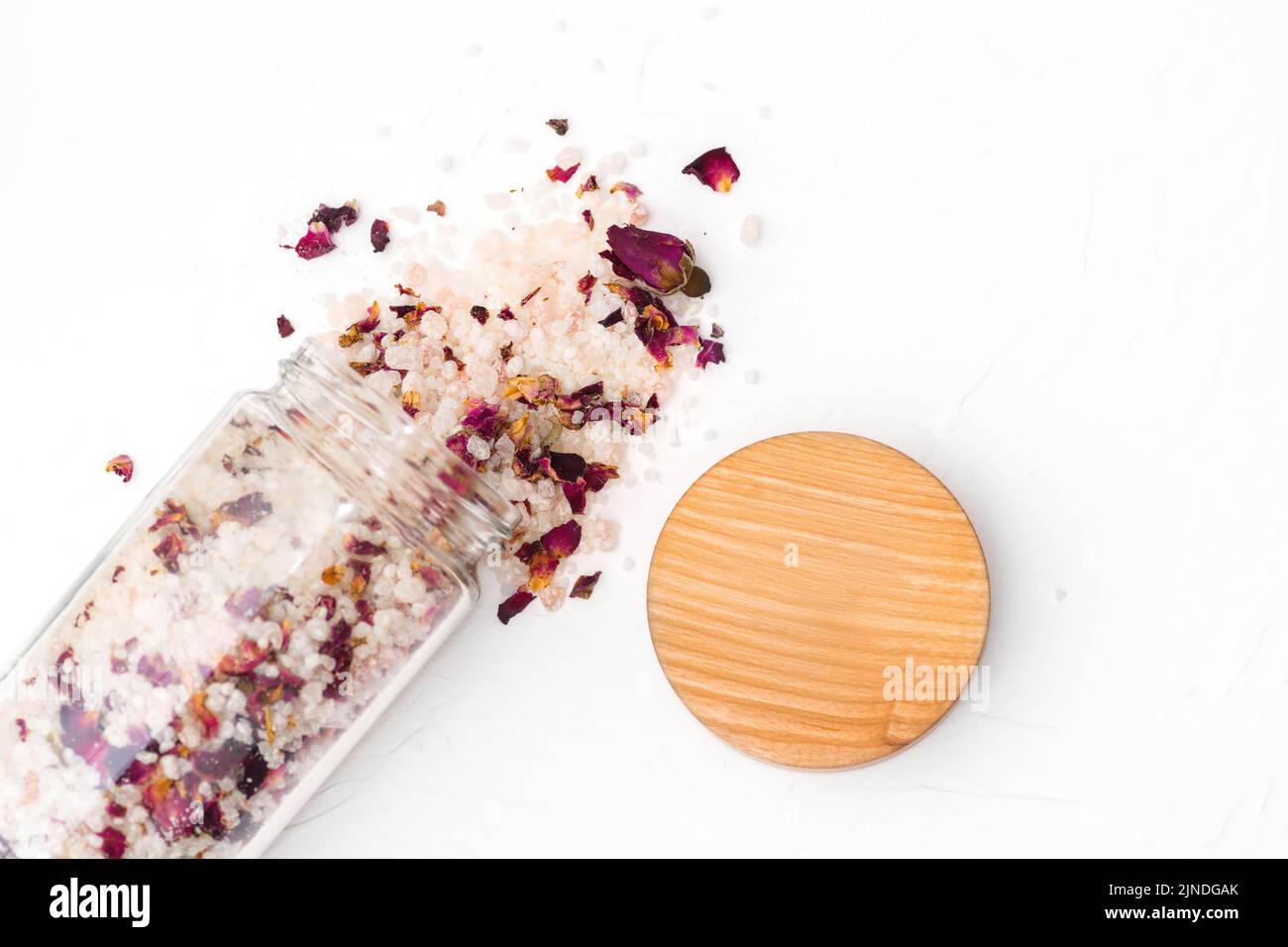 Beautiful natural handmade salt with roses on a white background Stock Photo