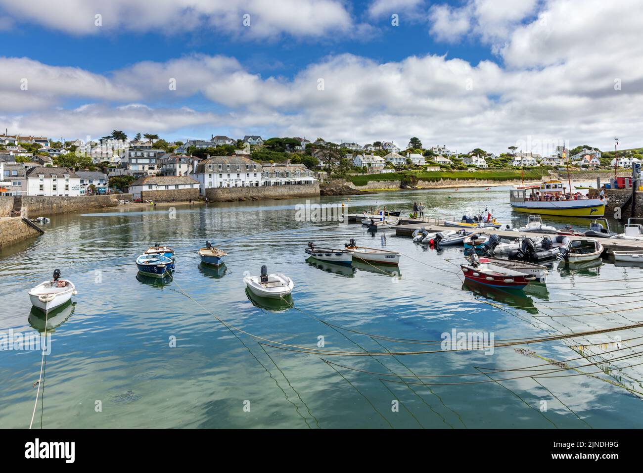 Moored boats at the picturesque harbour of St Mawes on the Roseland Peninsula in Cornwall. Stock Photo