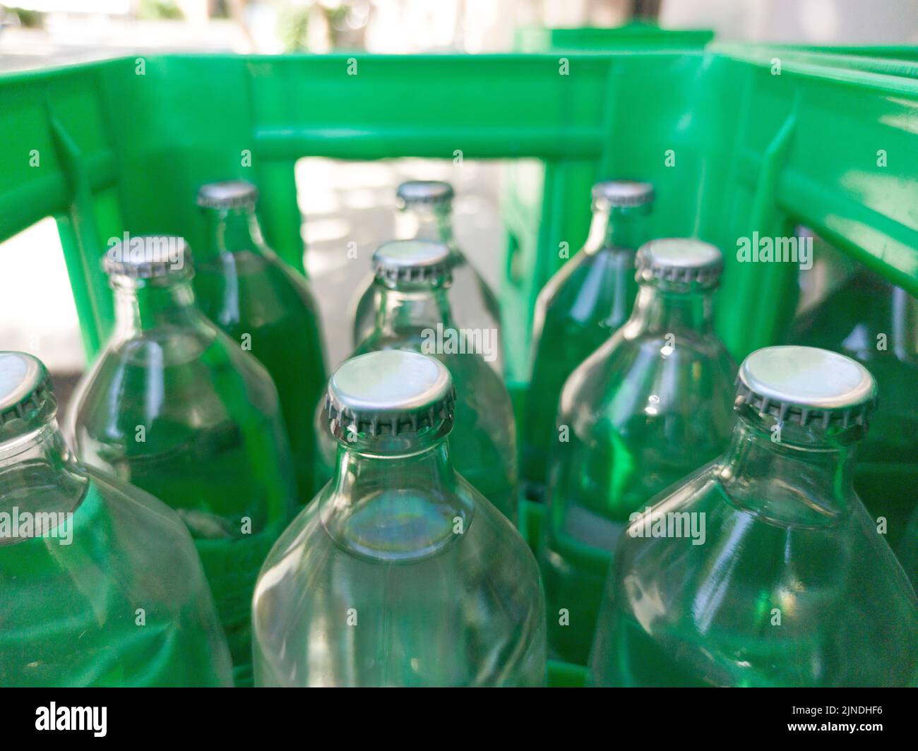Glass bottled water on his box. Selective focus Stock Photo