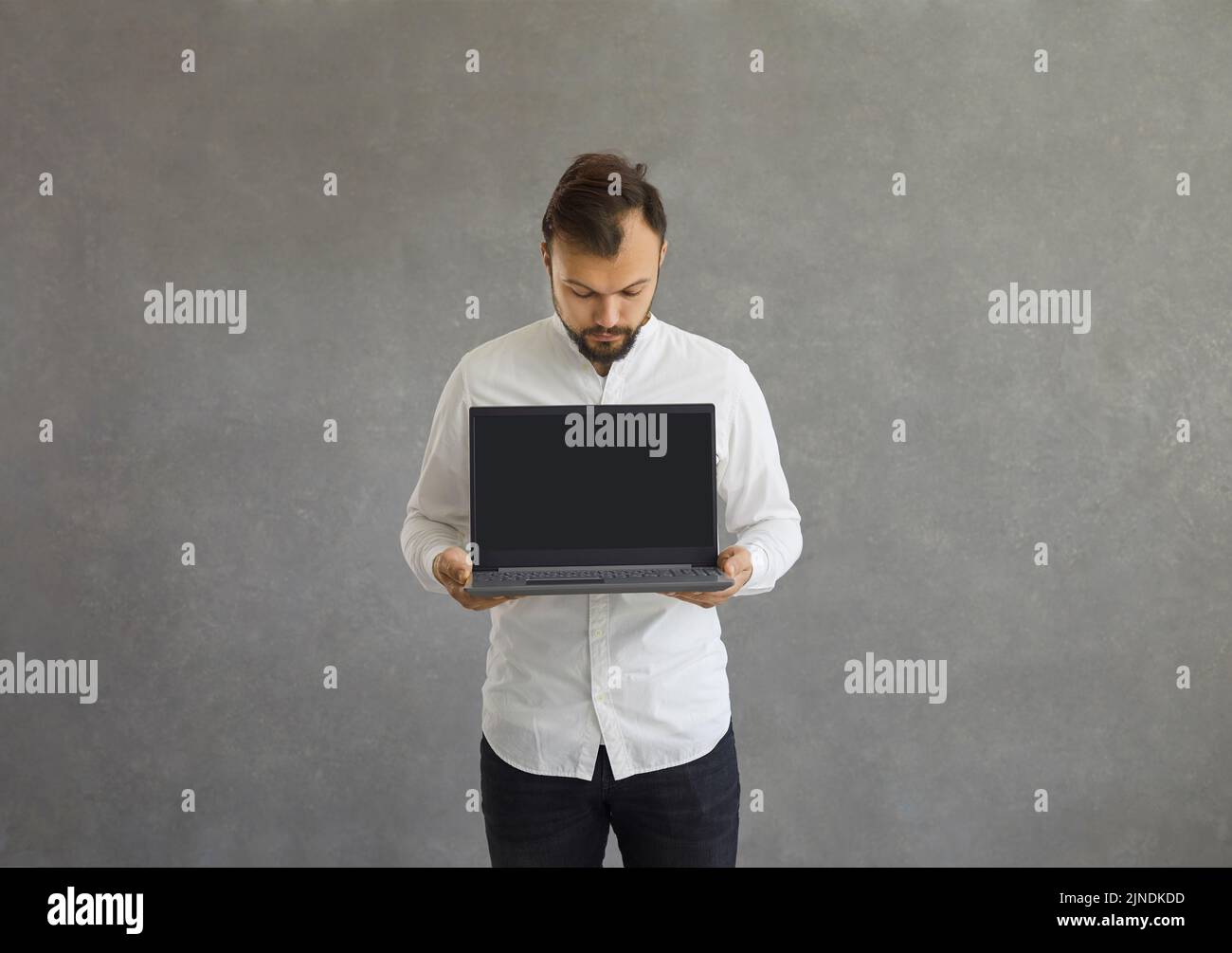 Young tech guy on computer hi-res stock photography and images - Alamy