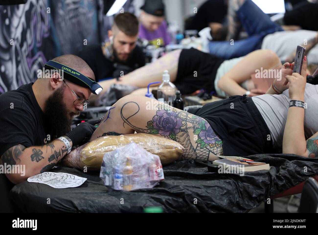 Krakow, Poland -  June 11, 2022: Unidentified  participant at 15th Tattoofest Convention in Cracow. One of the most prestigious tattoo festivals. Tatt Stock Photo